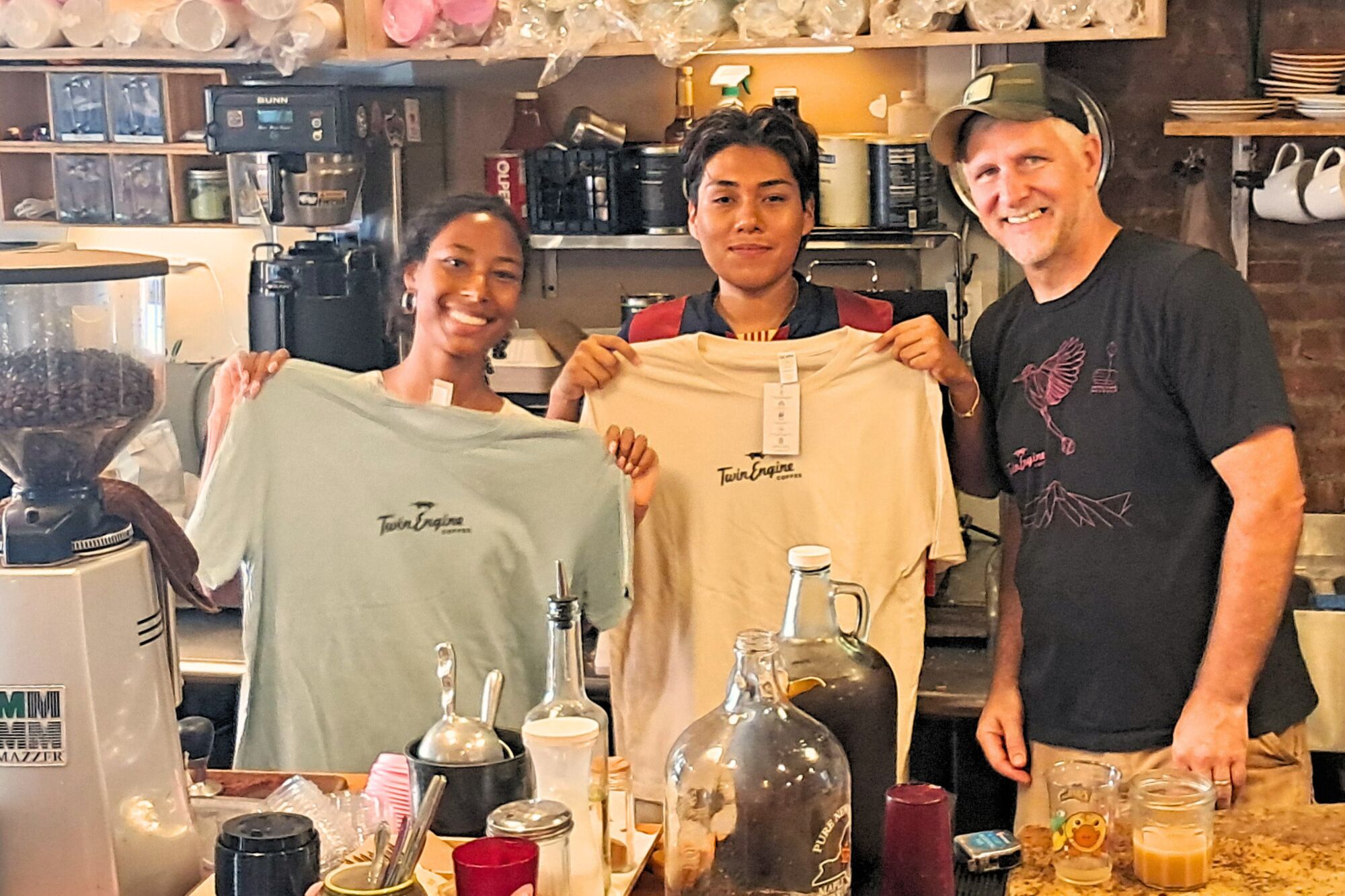 The Postmark Crew posing with our new Twin Engine Coffee tshirts